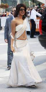 In 2009, Priyanka Chopra wore a white saree with a stunning belly button piercing during TIFF