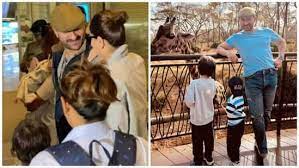 In a recent photo from Africa, Taimur and Jeh are focused on a giraffe while Saif Ali Khan poses for Kareena Kapoor